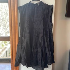 Free People black dress with lace details. Never been worn.